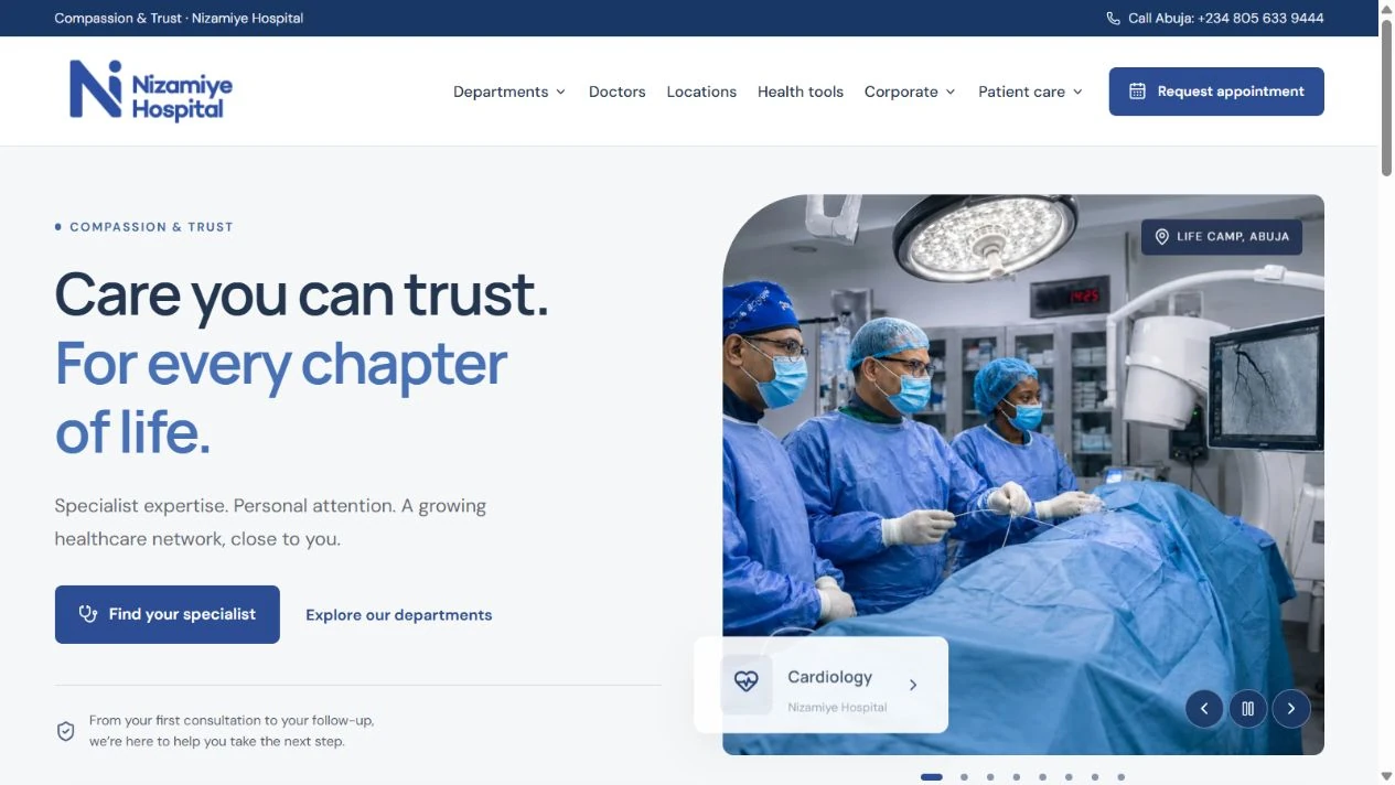 Nizamiye Hospital homepage with the original blue identity, care navigation and hospital imagery